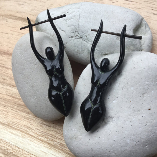 Womens Horn Earrings | goddess woman earrings, black, hanging.