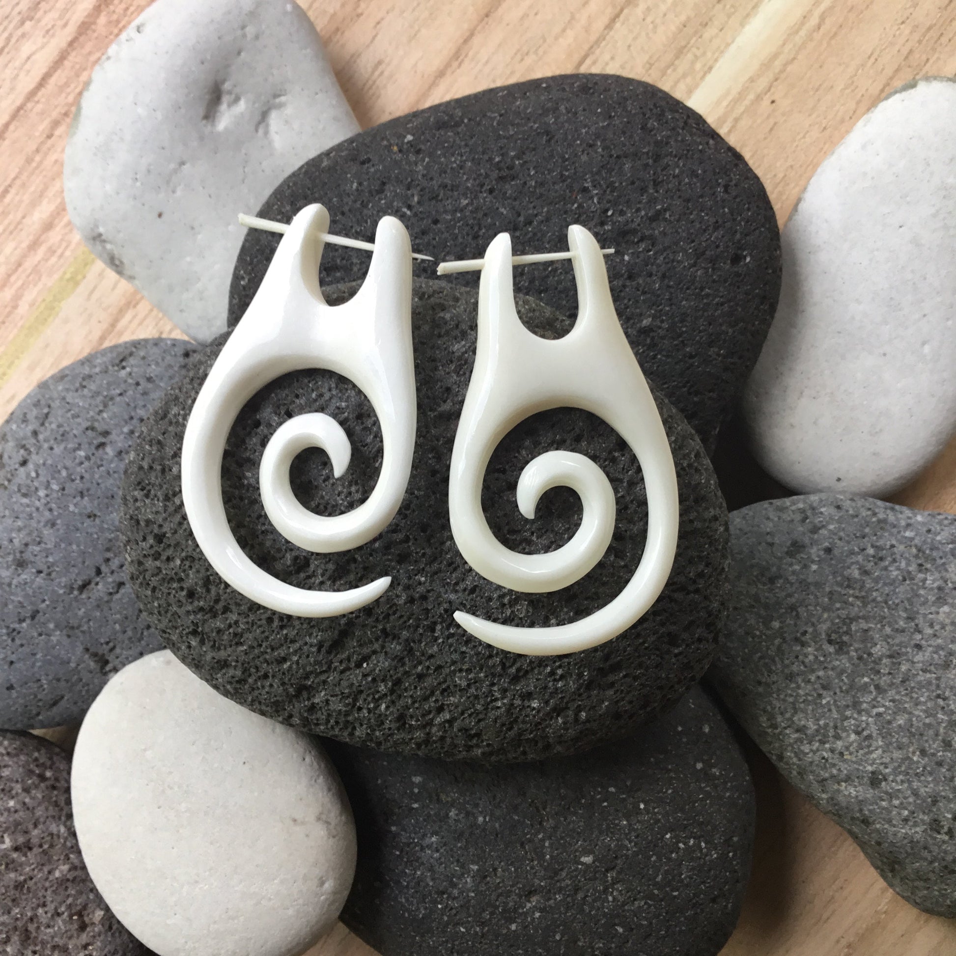 Spiral bone earrings.
