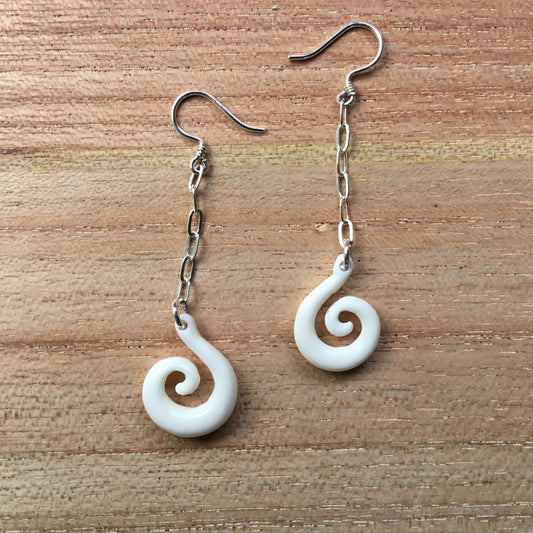 Spiral dangle earrings, white bone and silver. french hook.