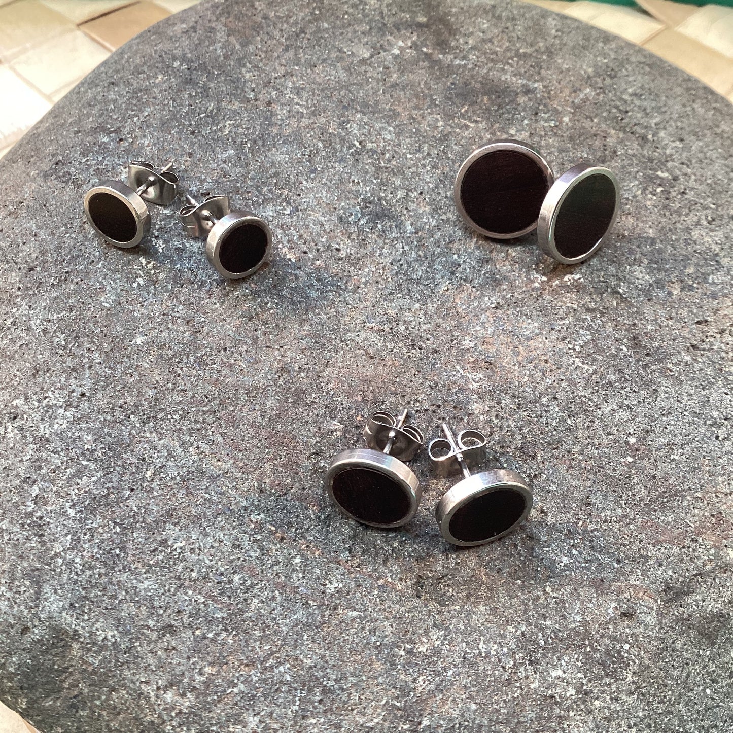 Black ebony wood and stainless steel, round post earrings.