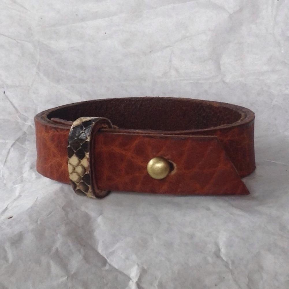 Oiled buckskin lined textured leather bracelet, with python strap.