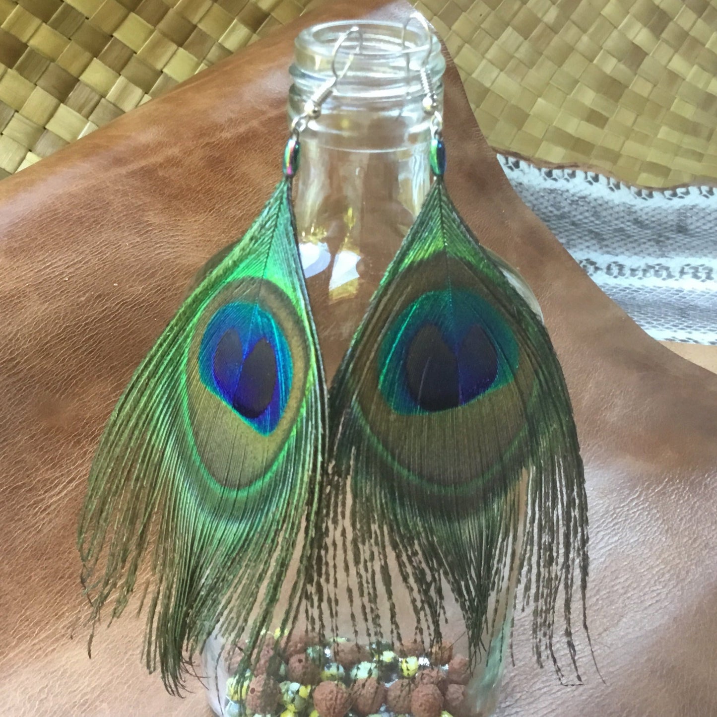 Long boho peacock earrings.