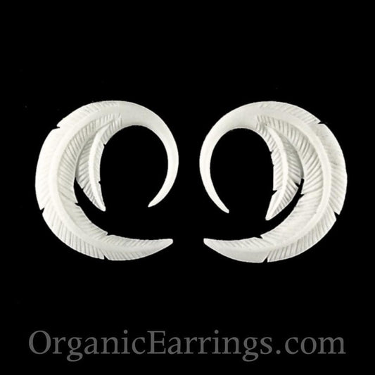 Ear gauges Bone Earrings | Piercing Jewelry :|: Feather. Bone 12g gauge earrings.