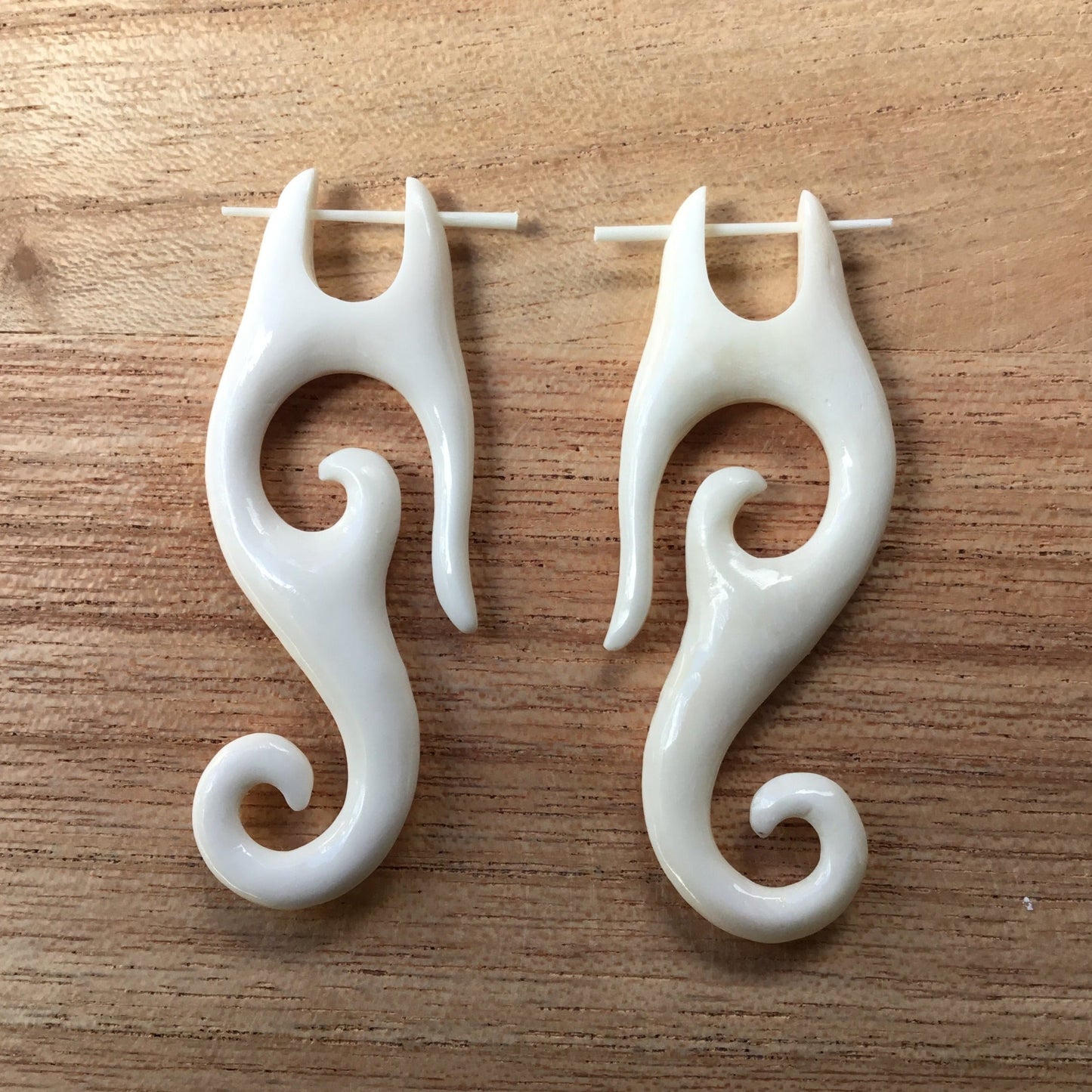 long spiral bone earrings, tribal.