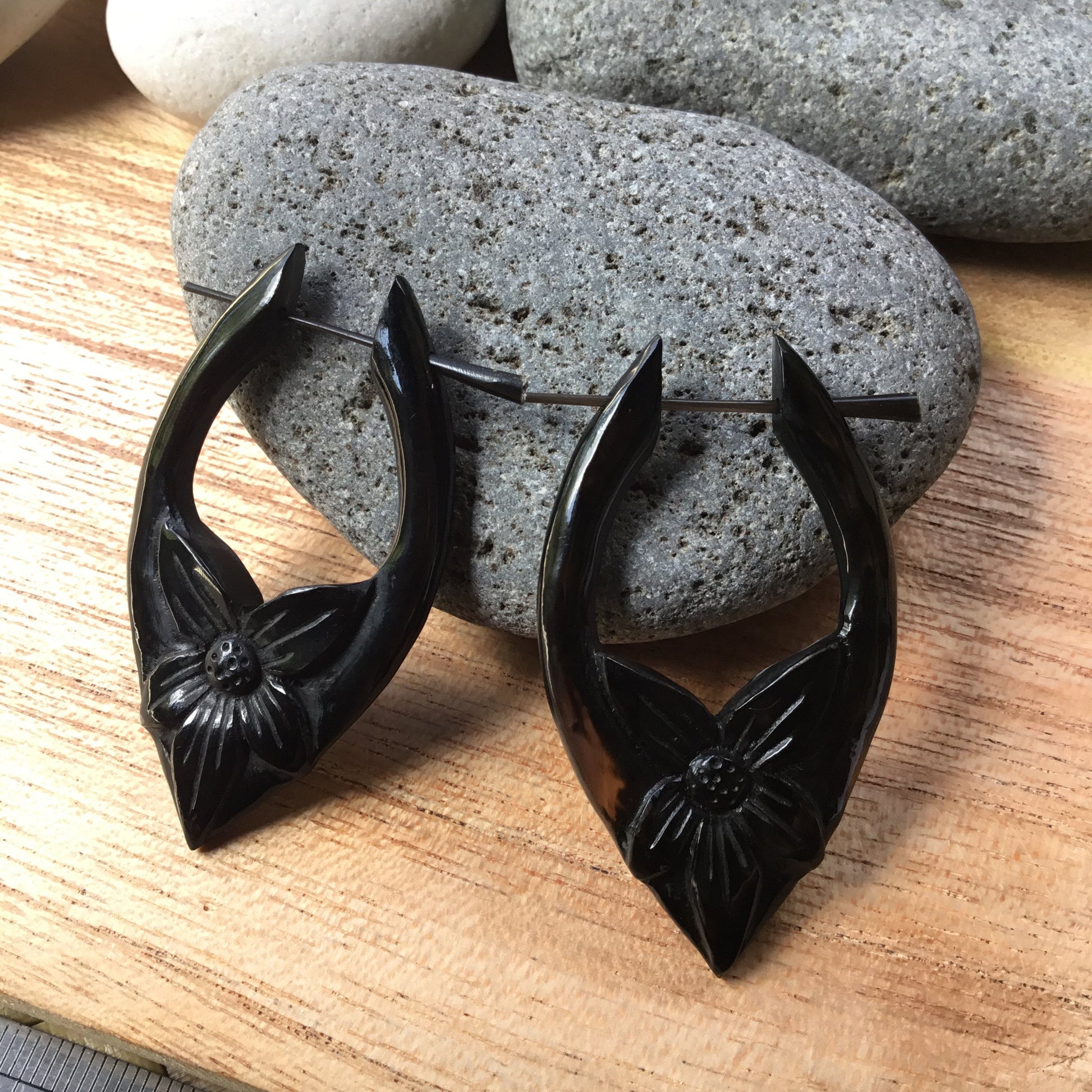 long black hoop earrings.