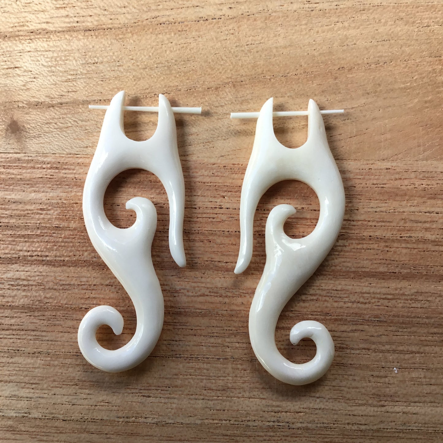 carved bone spiral earings.