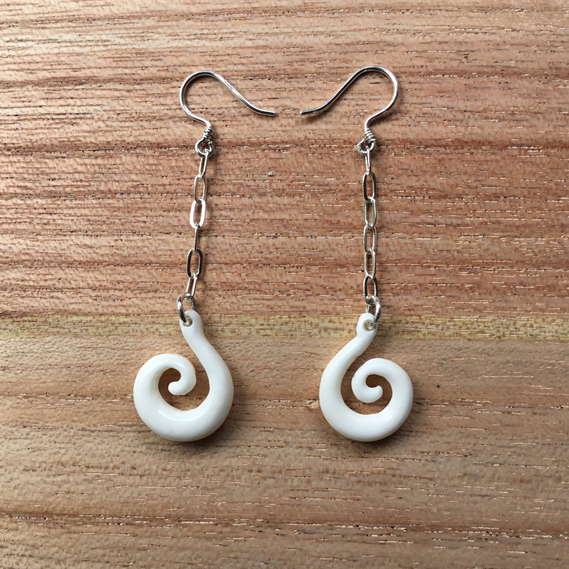 Long spiral drop earrings, white bone.
