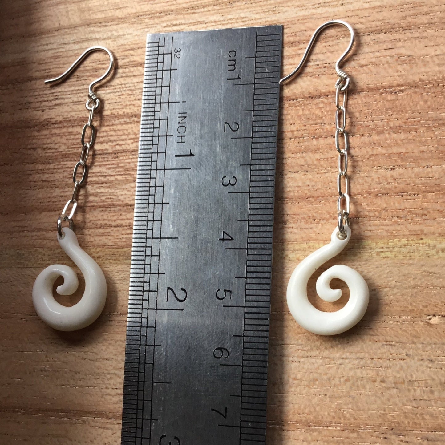 Spiral of life dangle earrings, bone and silver.