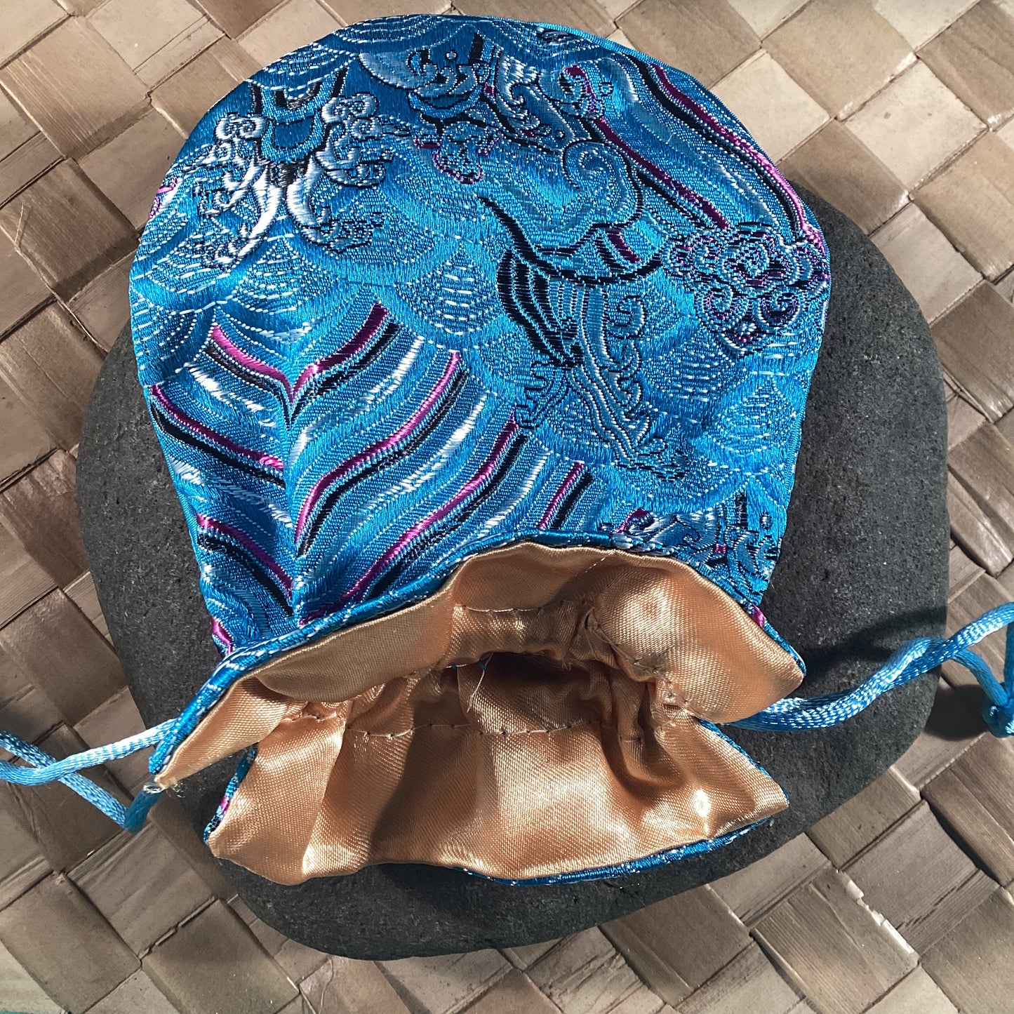 Blue Oriental silken storage and presentation pouch
