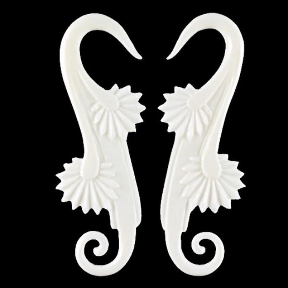 6 gauge earrings, long, white, carved.