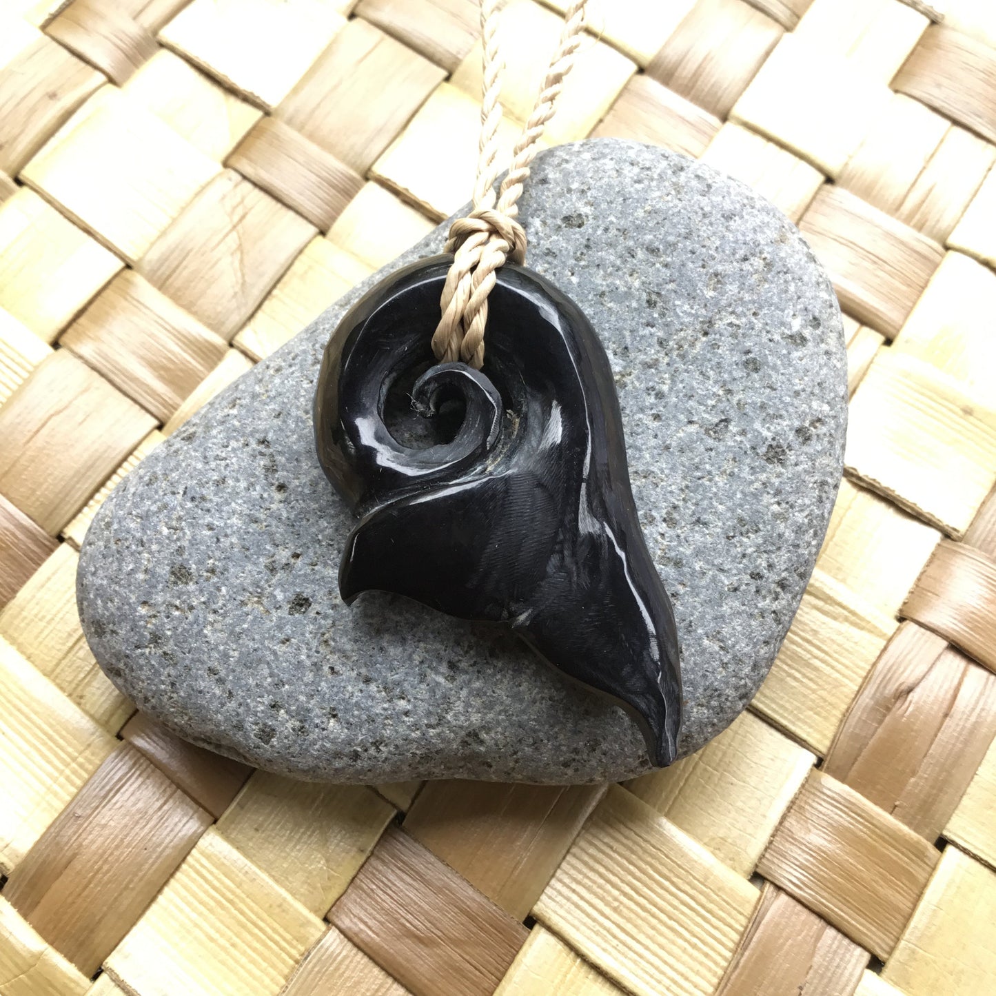whale tail necklace.