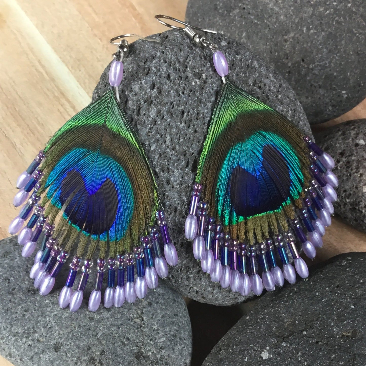 beaded feather earrings, lavender.