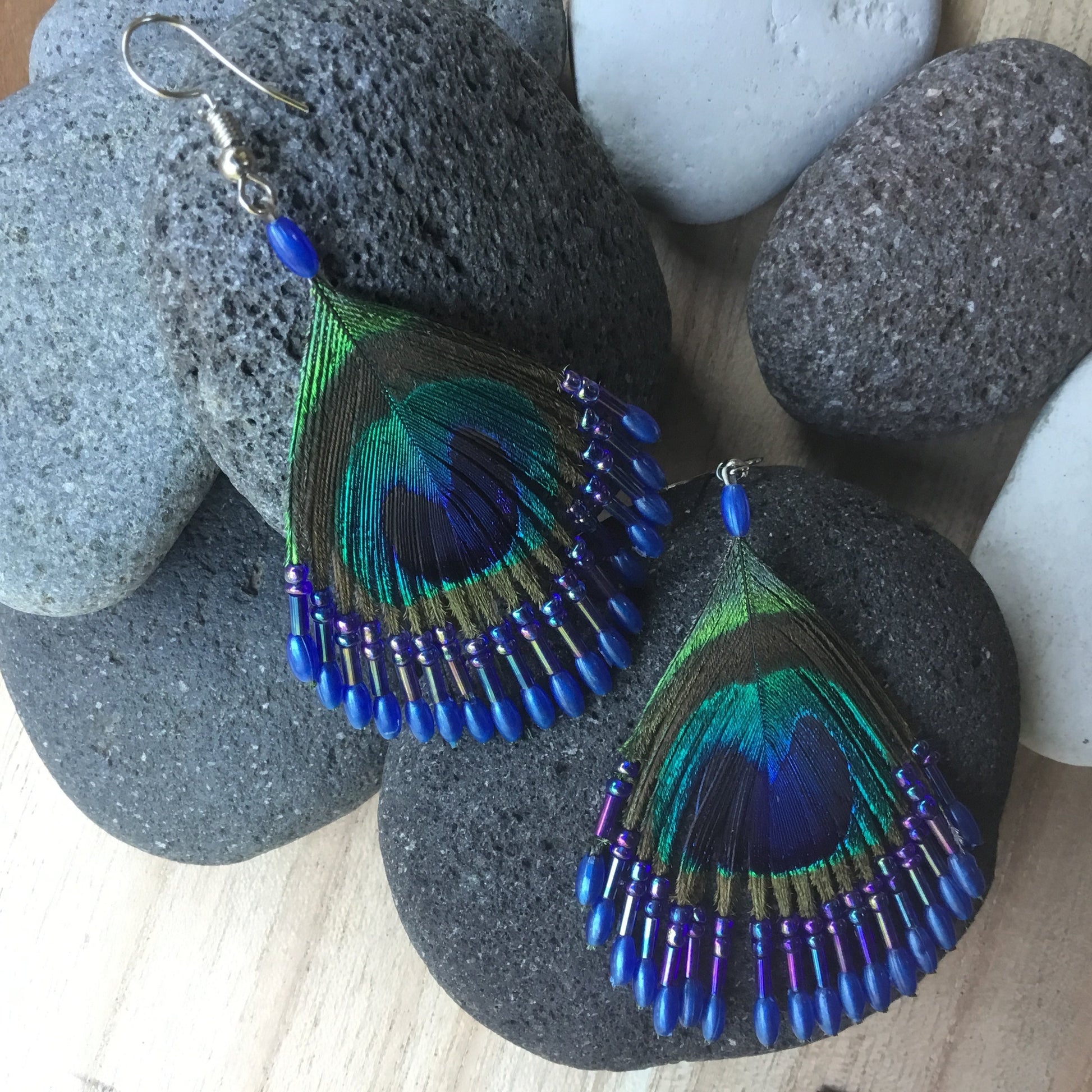 beaded feather earrings, peacock eye, blue.
