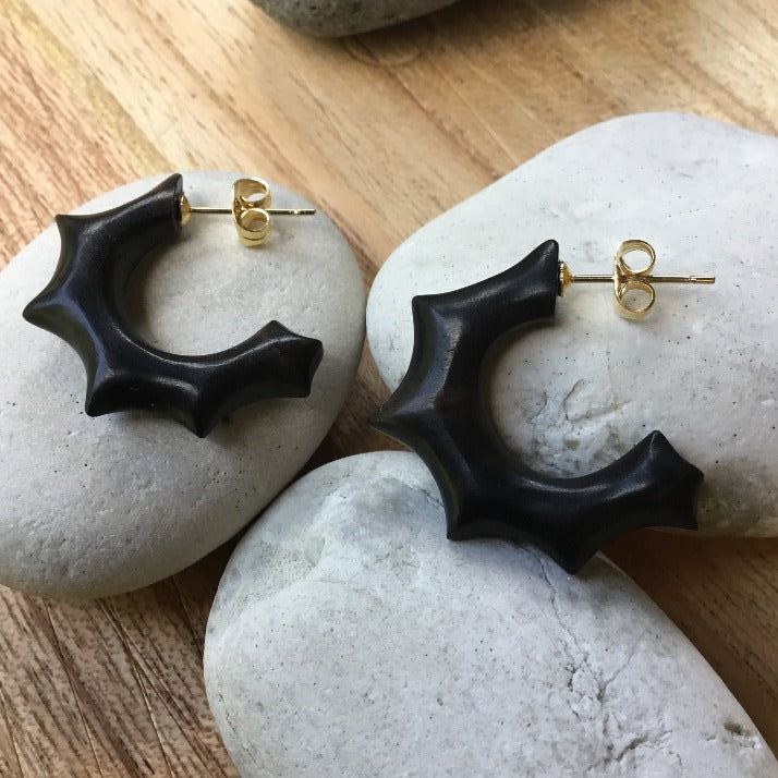 black wood hoop and gold stud earrings