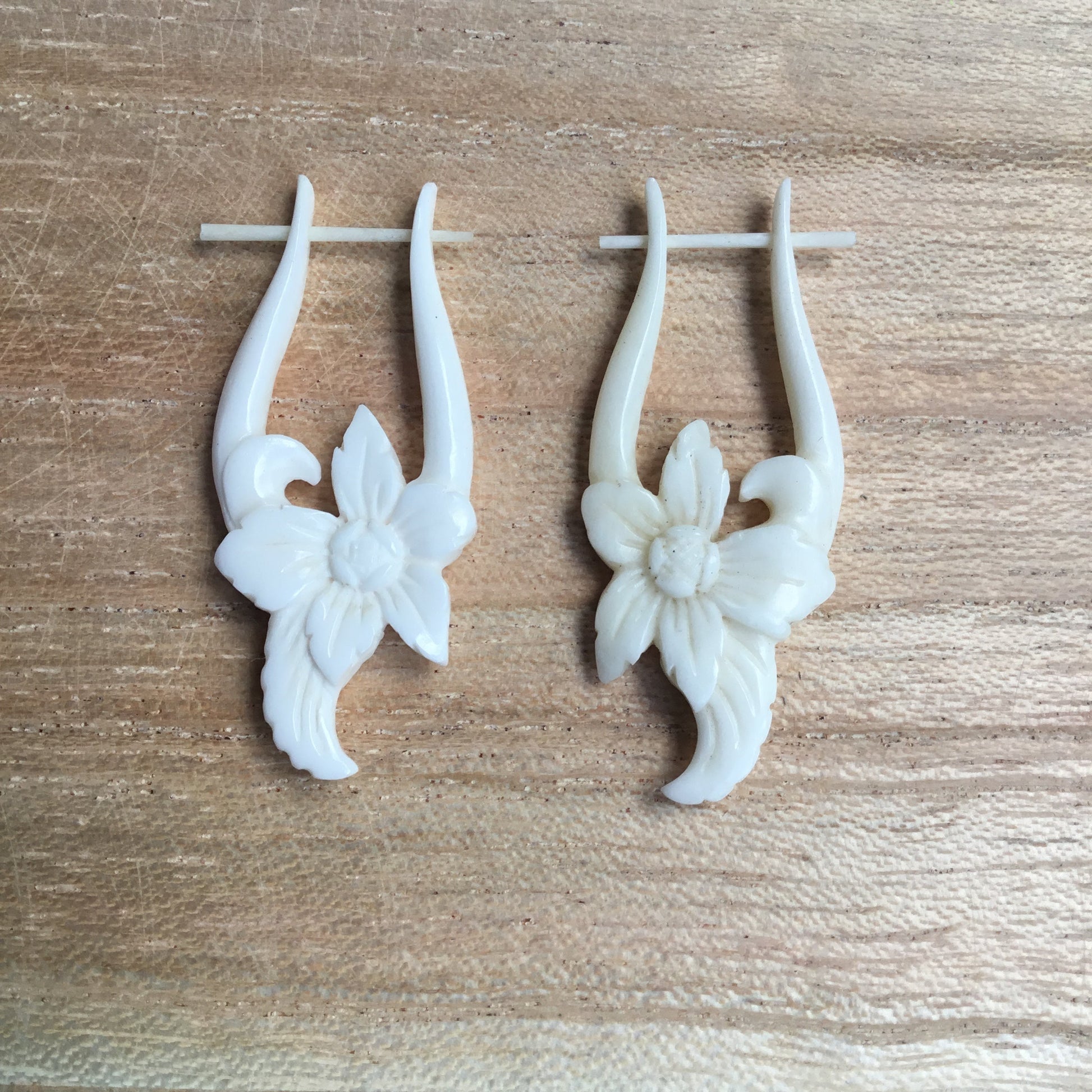 carved flower earrings