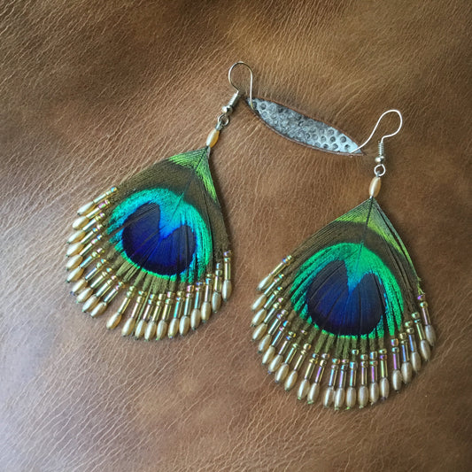 boho earrings. Peacock feather and beads.