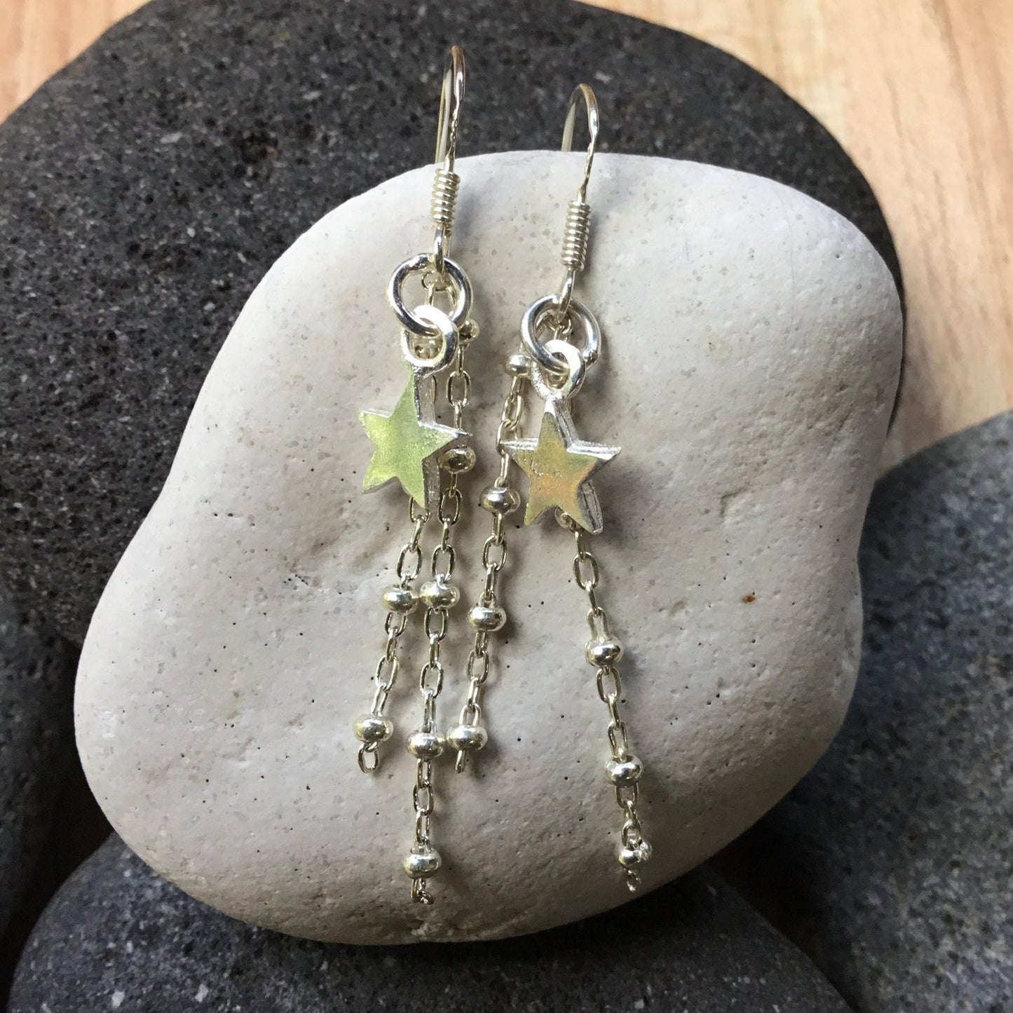 dangle earrings with star. silver french hook.