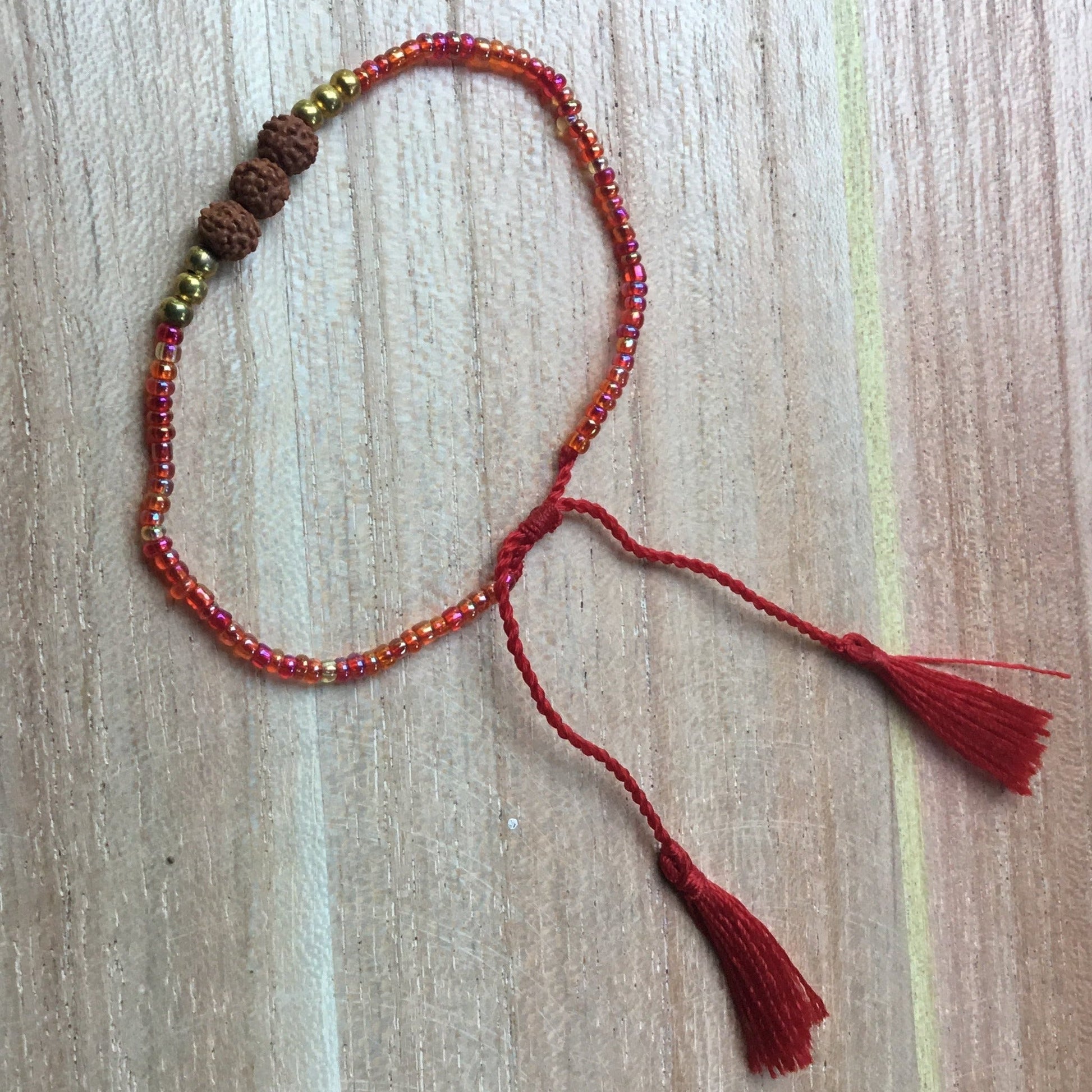 delicate rudraksha bracelet, red.