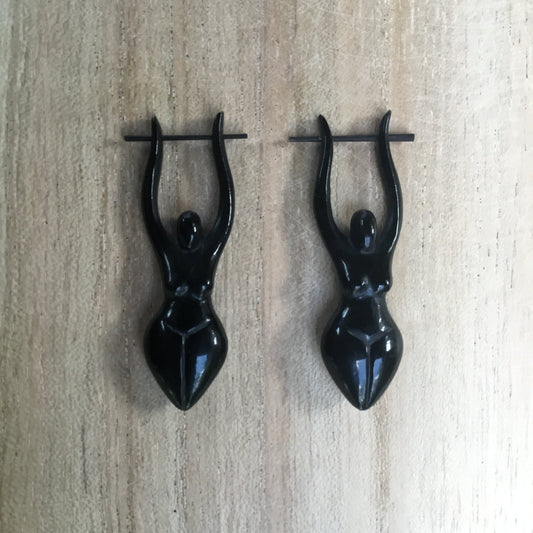 goddess woman earrings, black, hanging.