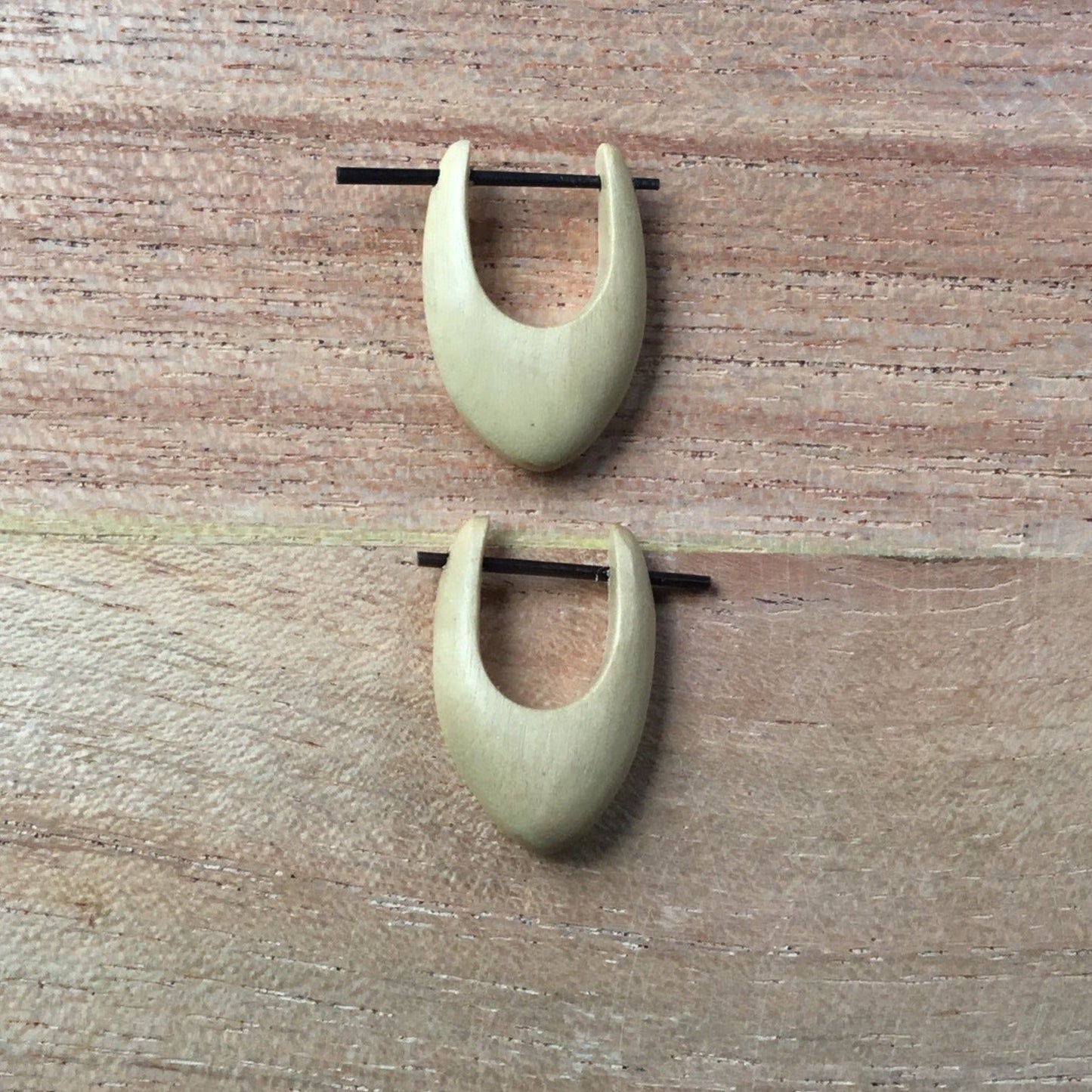 huggie hoop wood earrings.