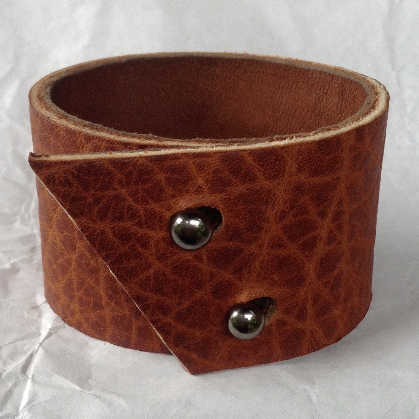 Kidskin lined deep textured leather bracelet. Wide cuff.