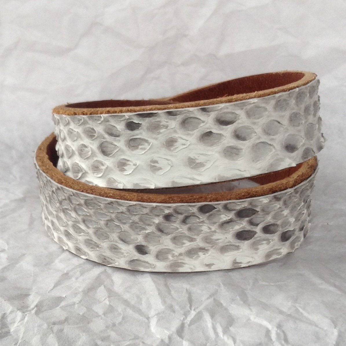 Python and caramel leather wrap bracelet. firm.