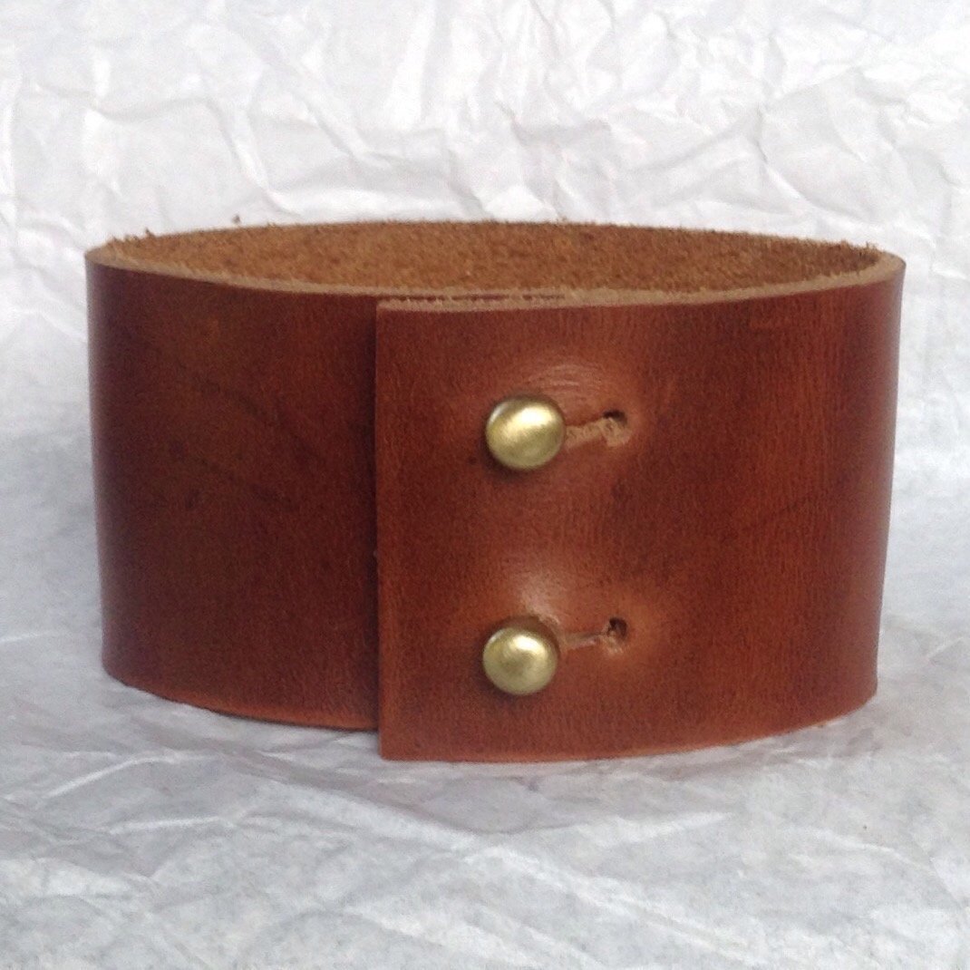 Wide caramel leather cuff bracelet.