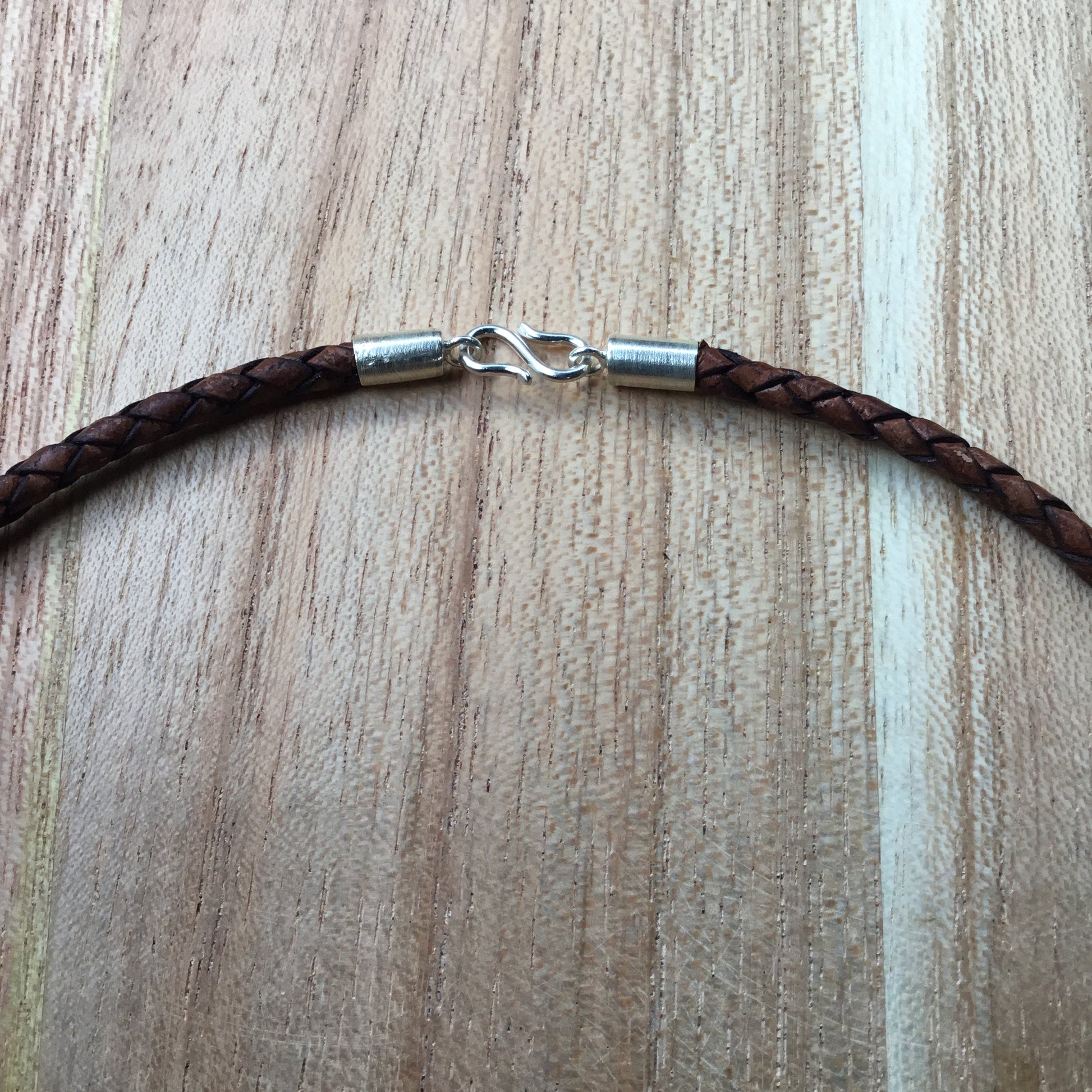 braided leather necklace cord, sterling silver hook.