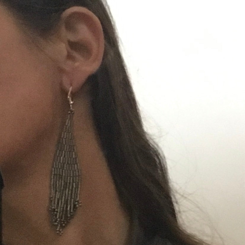 long beaded earrings.