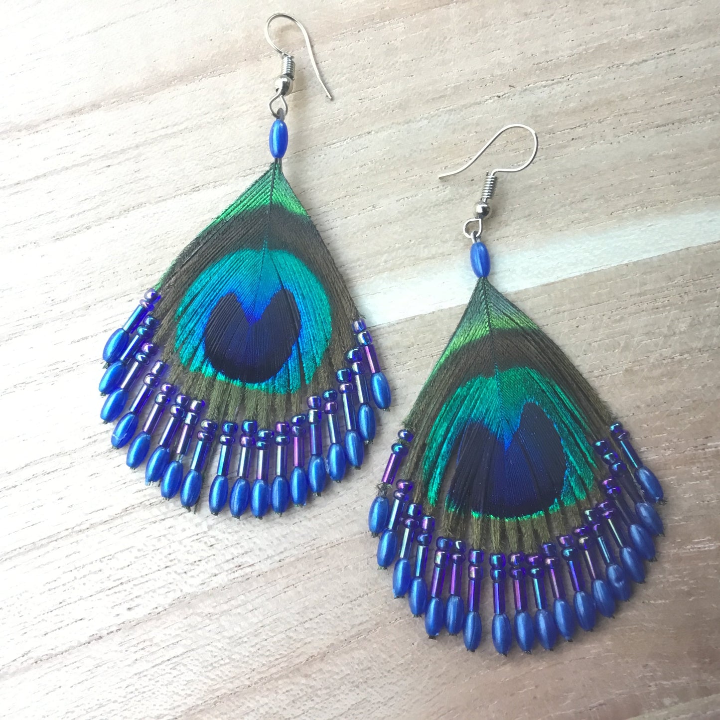 peacock feather earrings, sapphire blue beaded. long, retro vintage