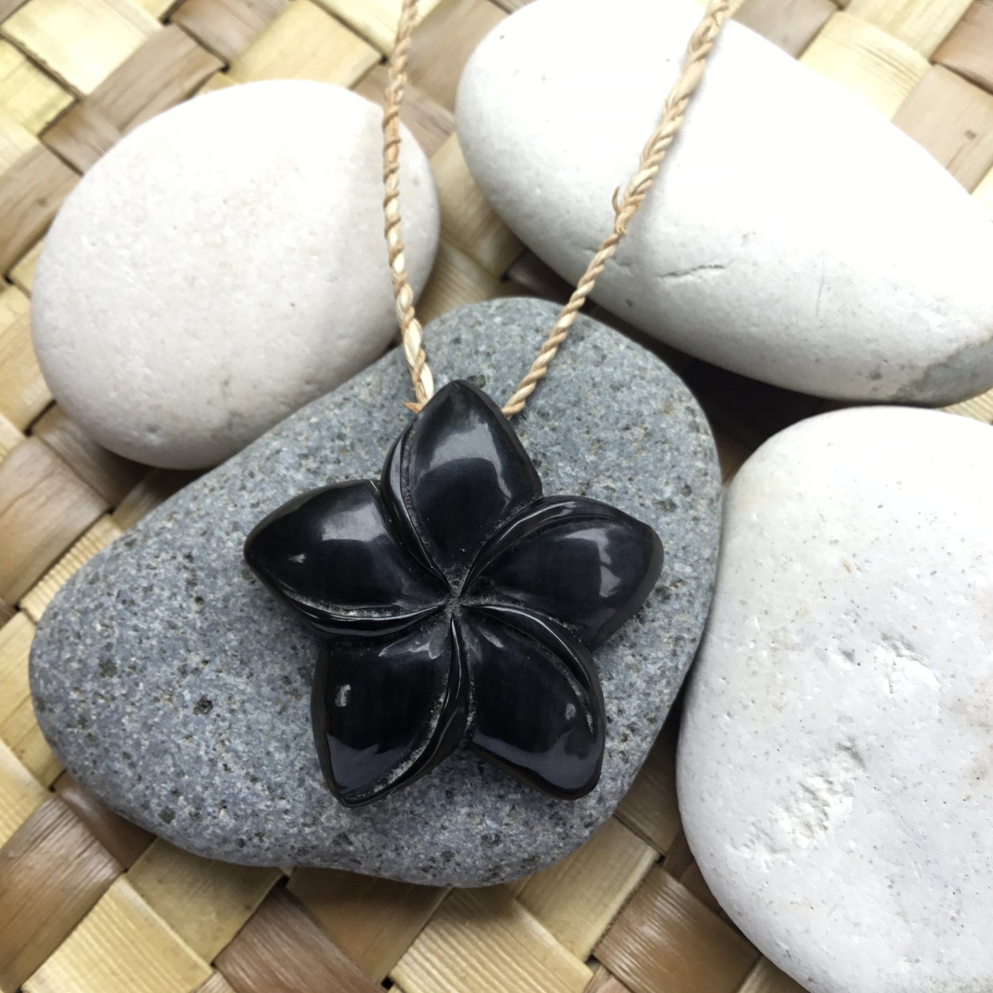 plumeria flower carved necklace, black.
