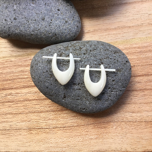 small hoop earrings, bone.