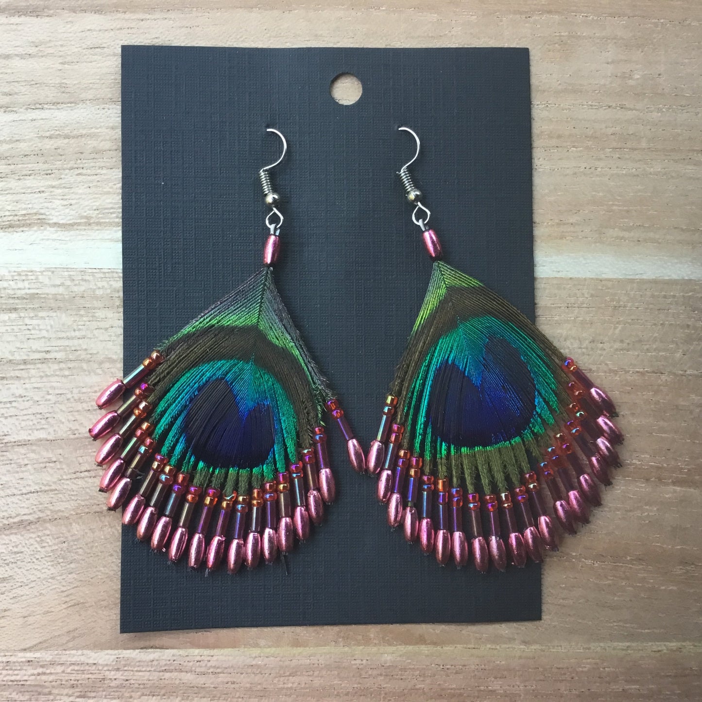 Retro vintage feather earrings, peacock eye and beads.