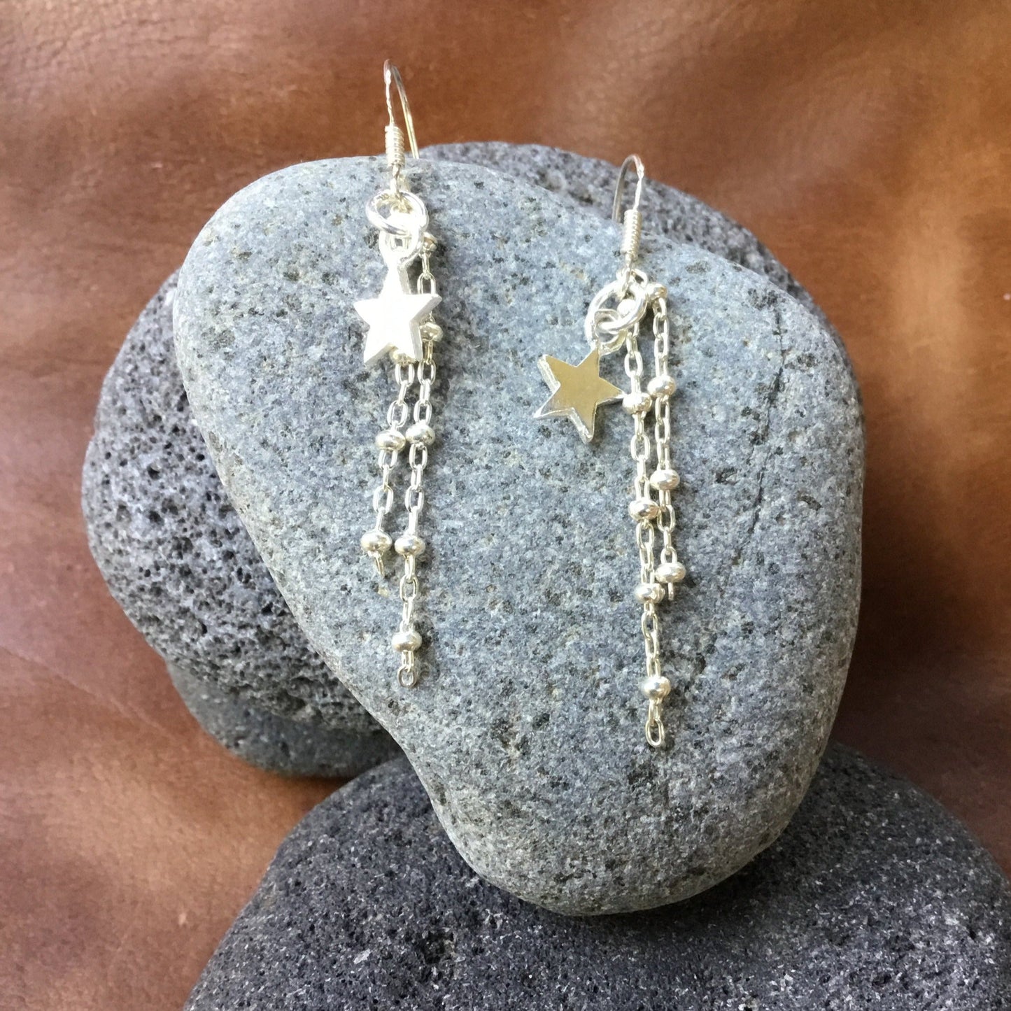shiny star earrings.