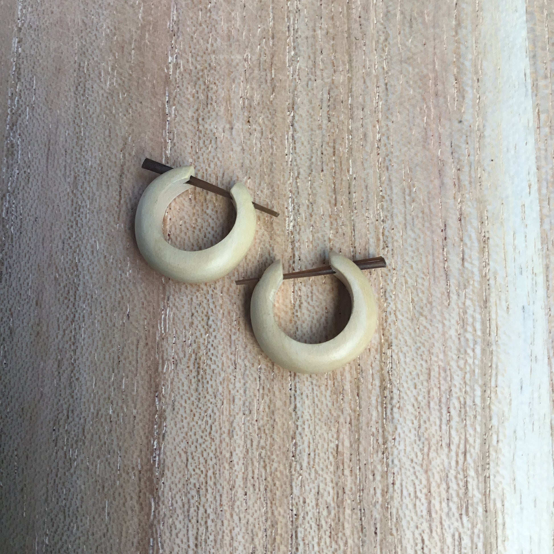 small earrings. wood hoop.