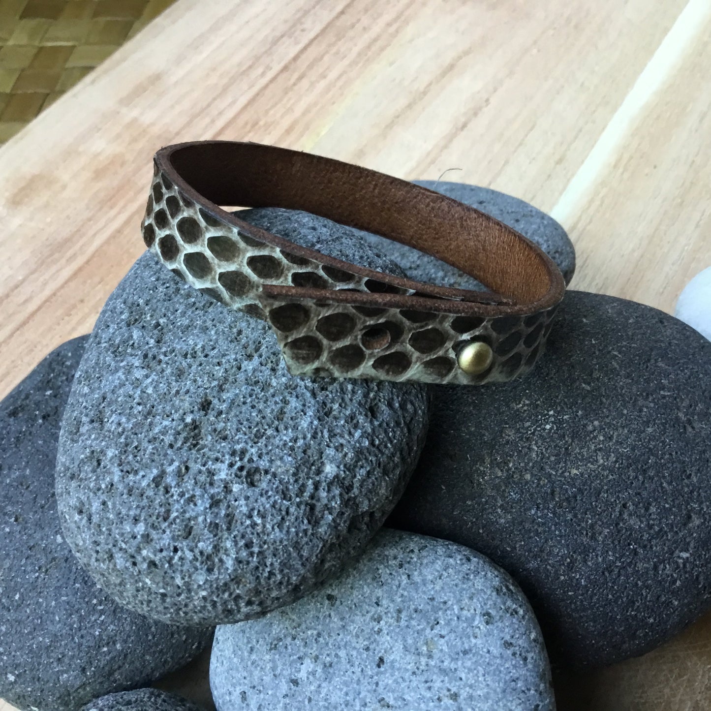 snakeskin bracelet.