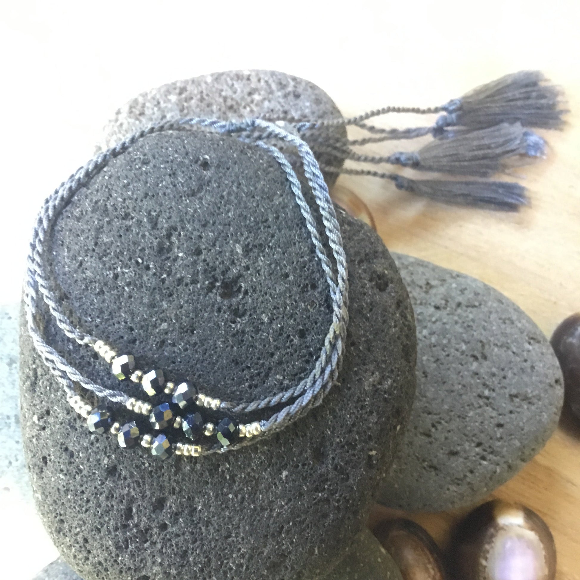 thin bead stacker bracelets, grey.