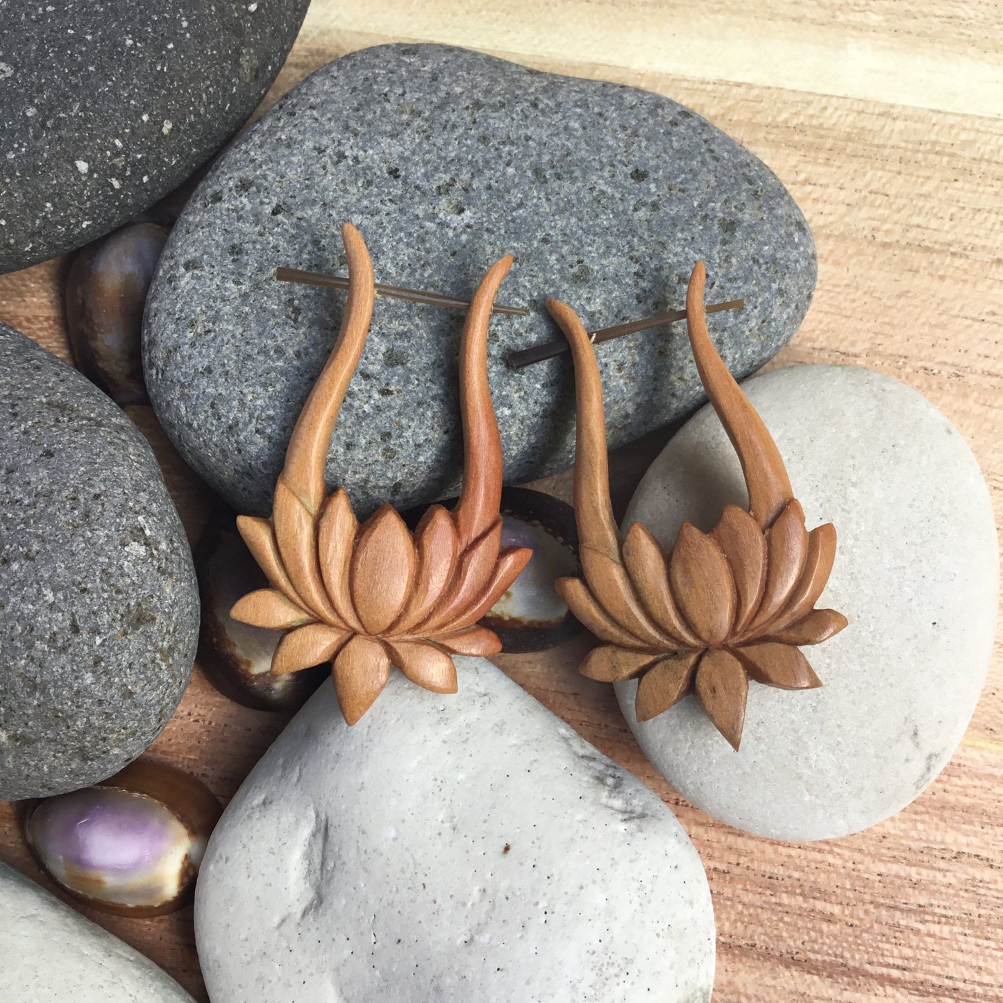 tribal lotus earrings, wood.