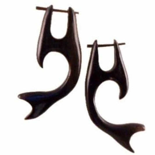 carved whale tail earrings, black.